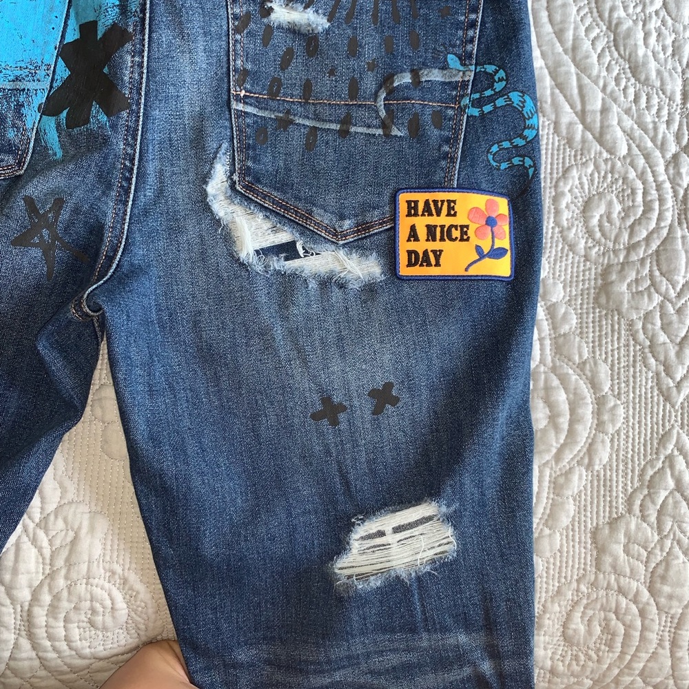 American Eagle painted and patched jeans